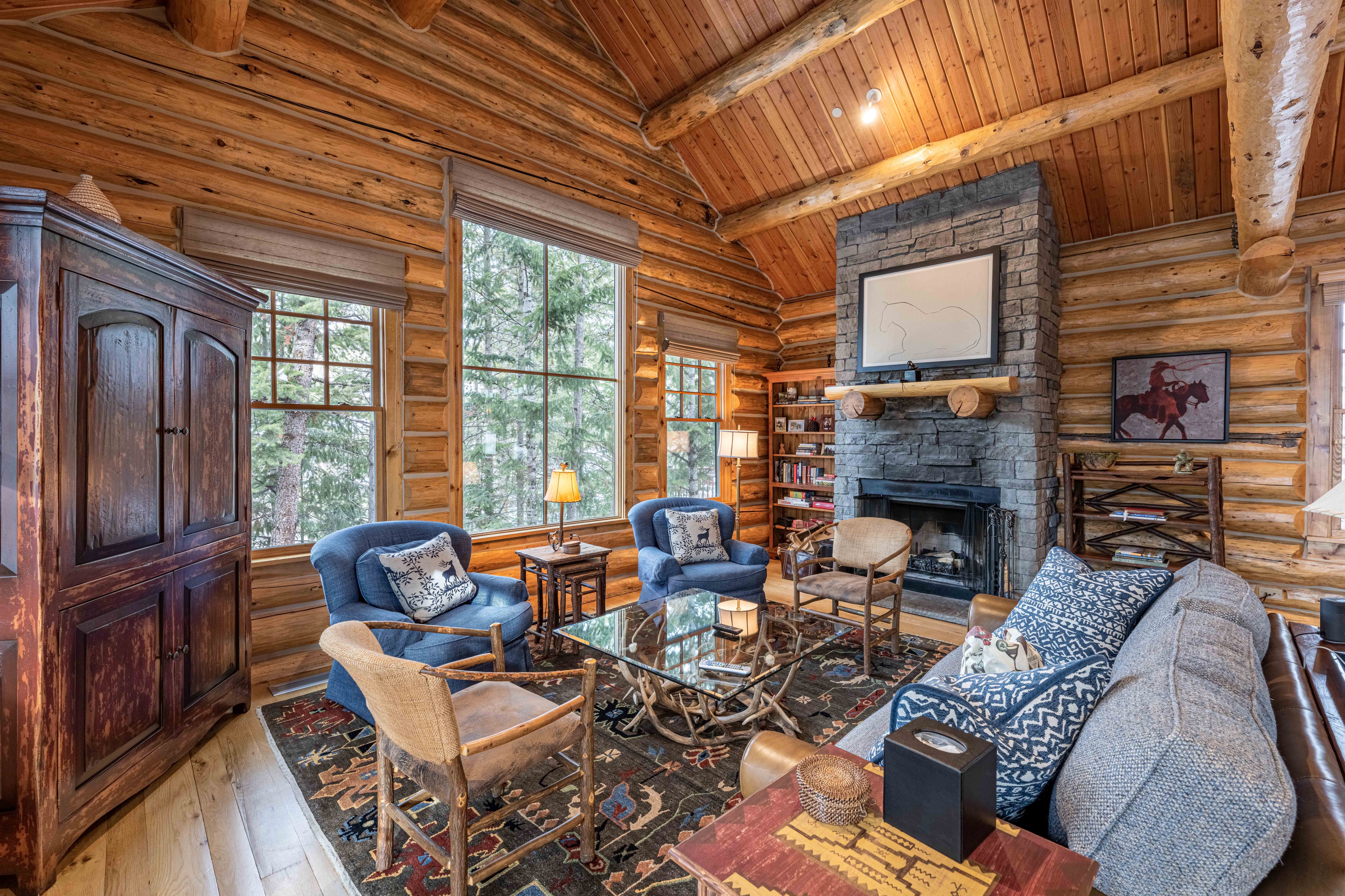 Living room with stone fireplace